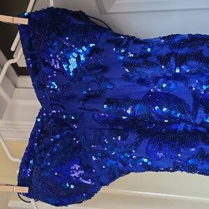 Formal dress by B. Darlin in size 3/4. Fitted silhouette with thin back strap